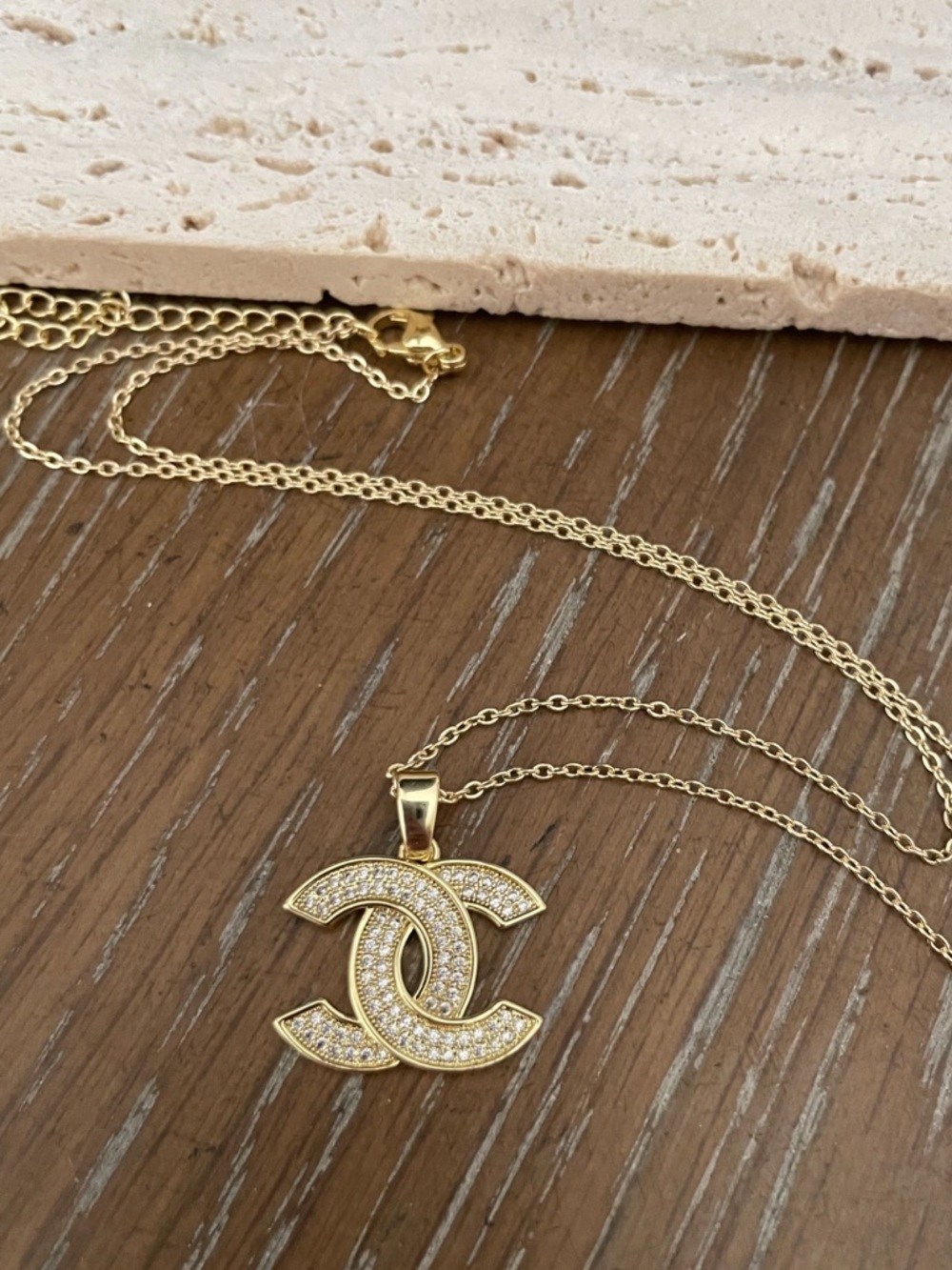 Chanel Gold Crystal Logo Pendant Necklace